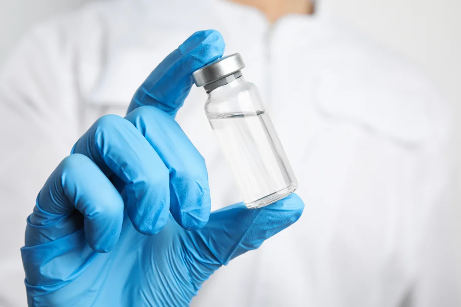 a nurse holding a vial of semaglutide